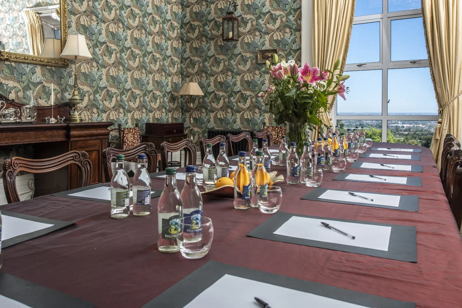 Ornate room set with a long table