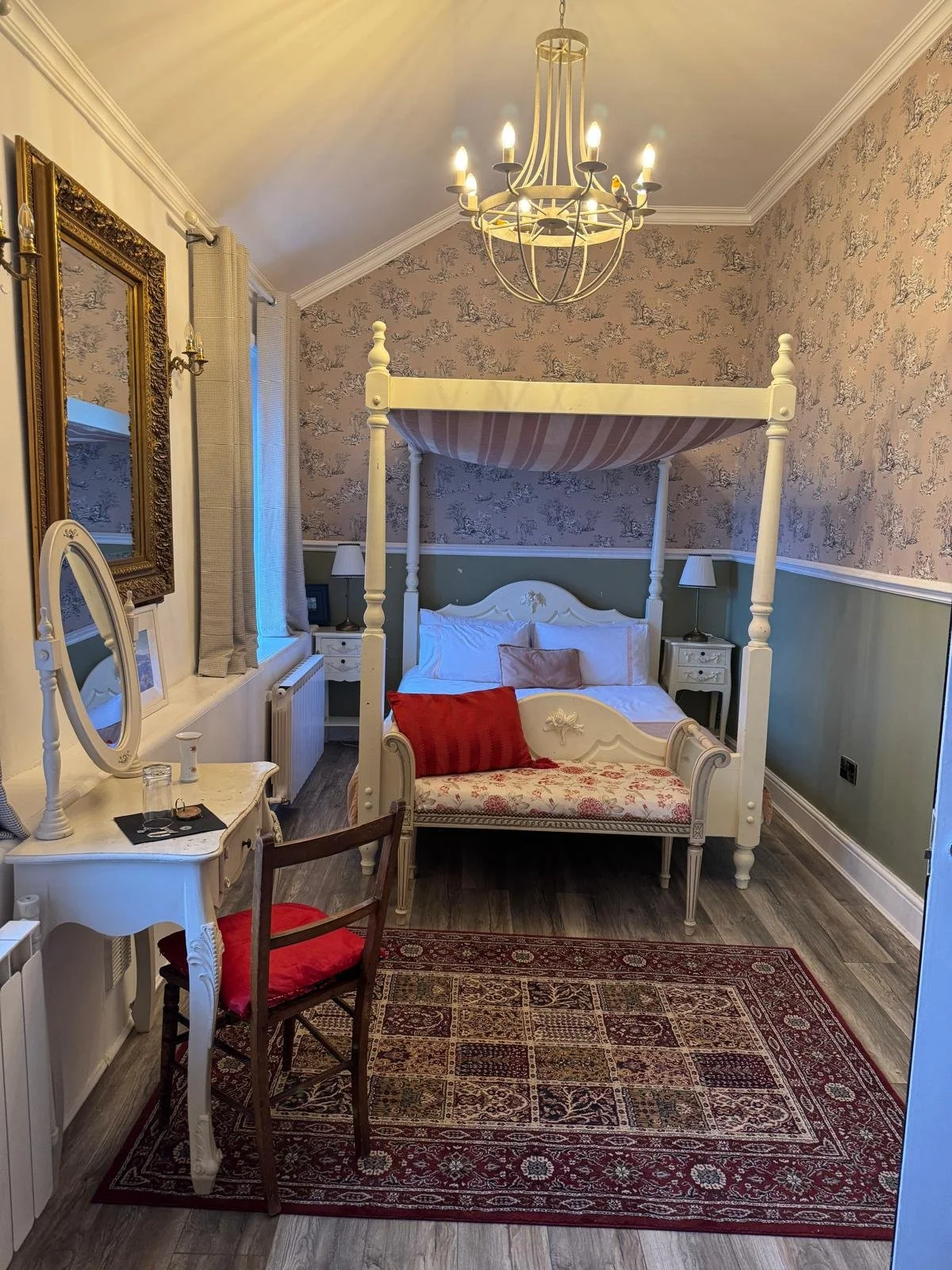 Guest bedroom with a view across the grounds