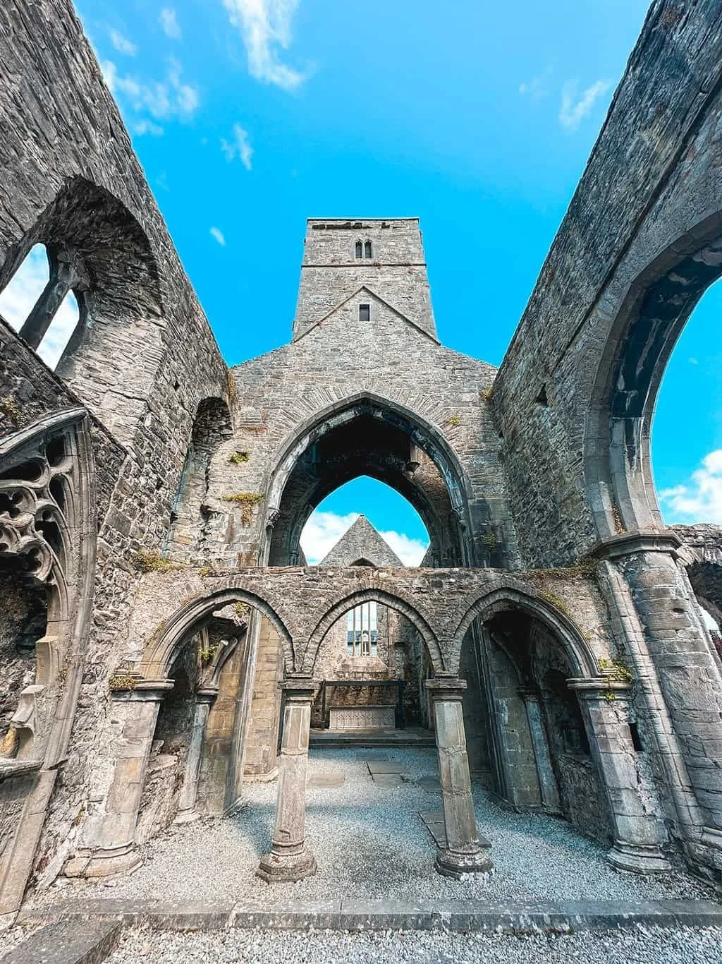 The stone cloister and arches of Sligo Abbey