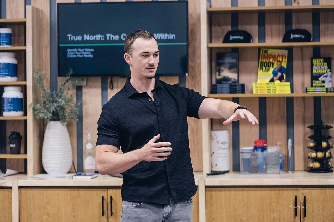Brady leading a session with a full room