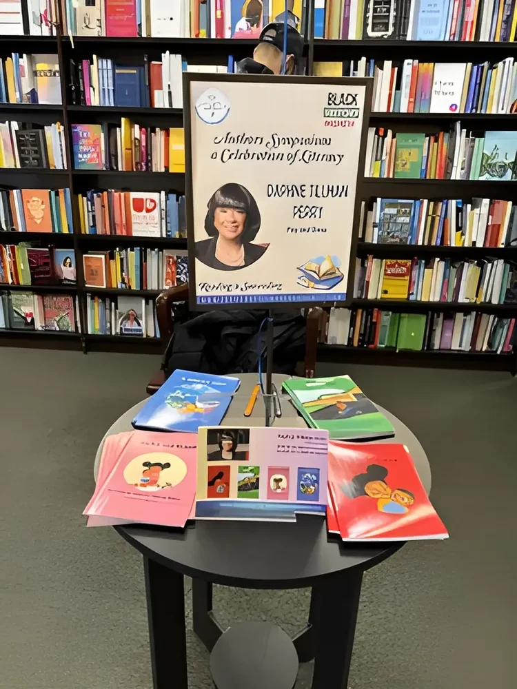 Daphne Tillman Perry’s six children’s books displayed at an author symposium