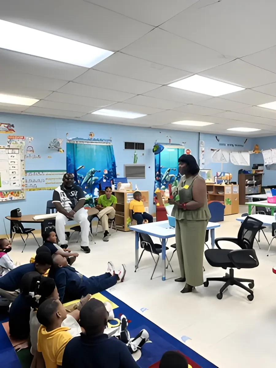 Daphne Tillman Perry talking with students in a classroom