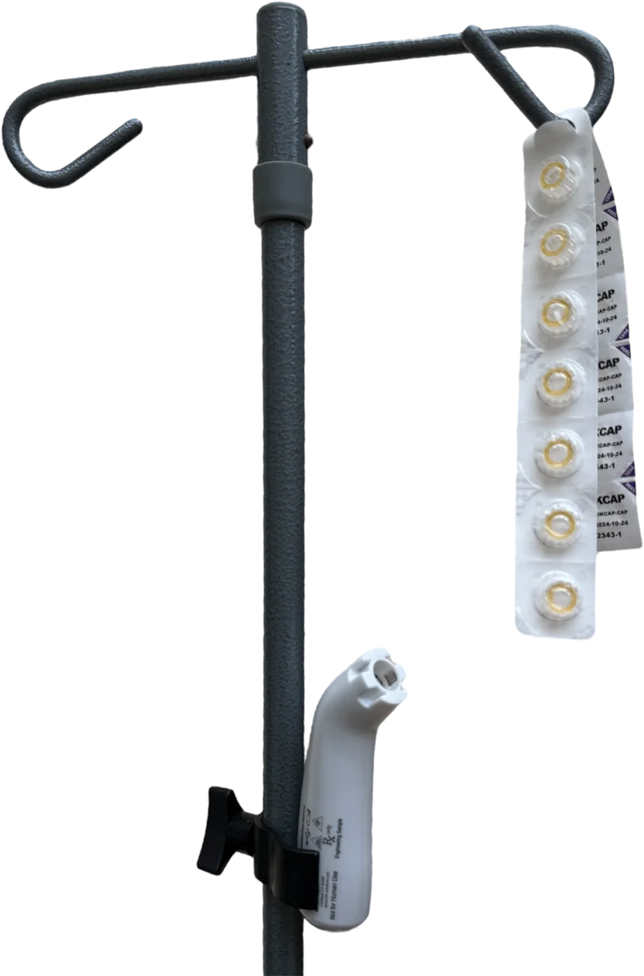 QIKcap cap strip on an IV pole