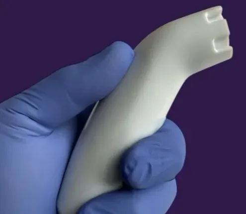 QIKcap device in a gloved hand