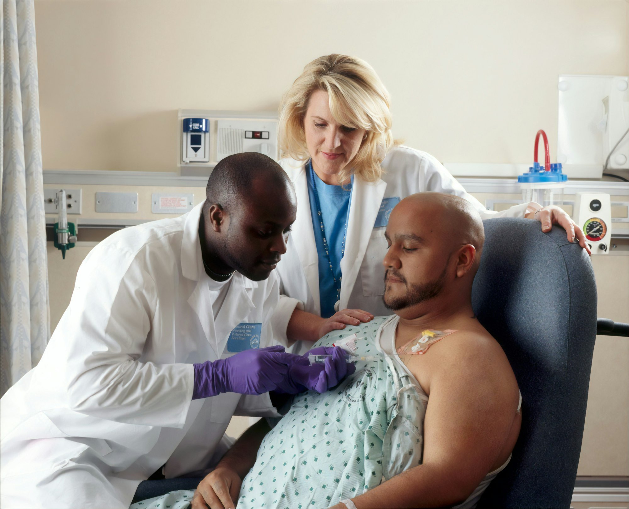 Clinicians at a patient bedside