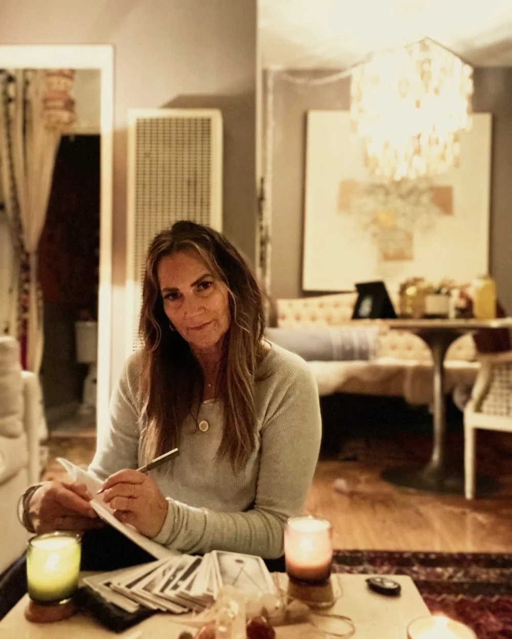 Alise journaling at a table