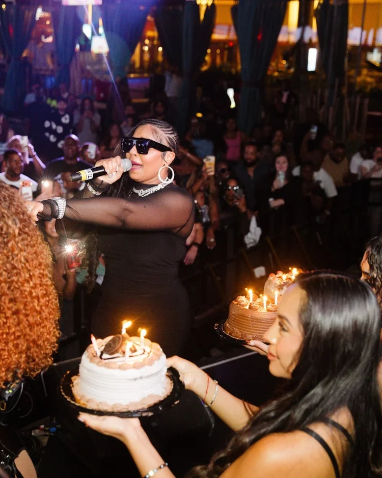 Birthday cake with candles delivered to a VIP table during bottle service at The Pool After Dark