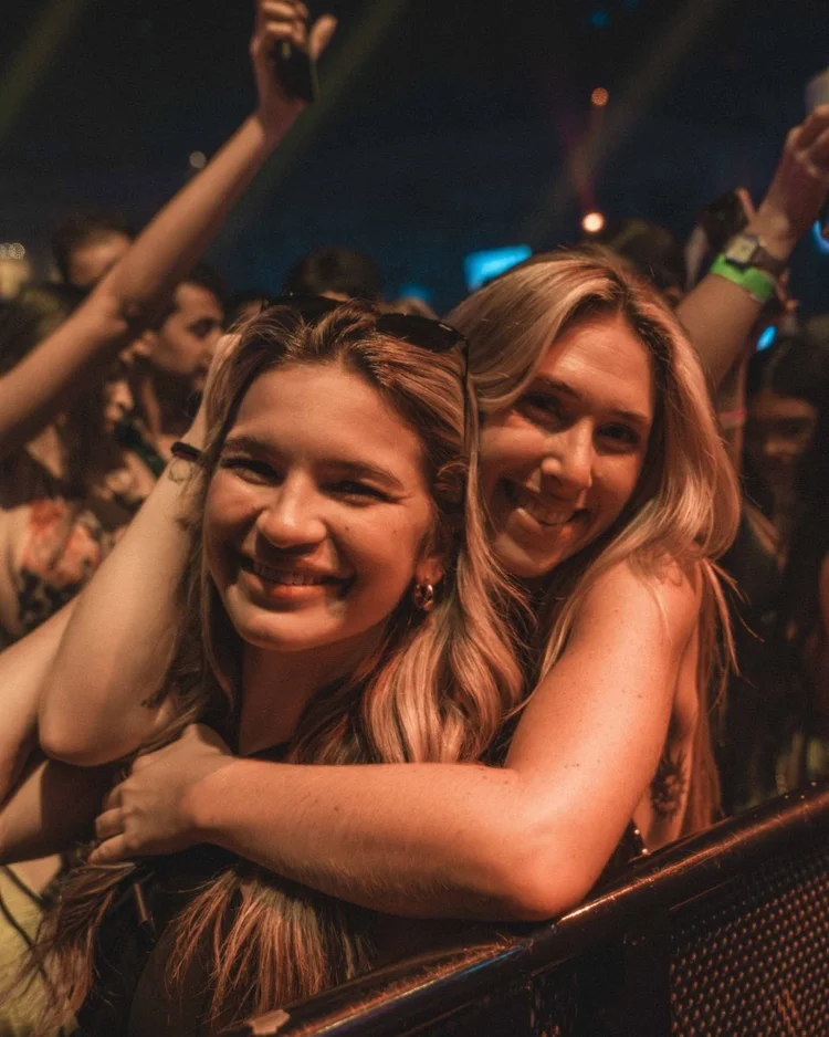 Two fans smiling in the crowd at Levity, The Pool After Dark, Atlantic City
