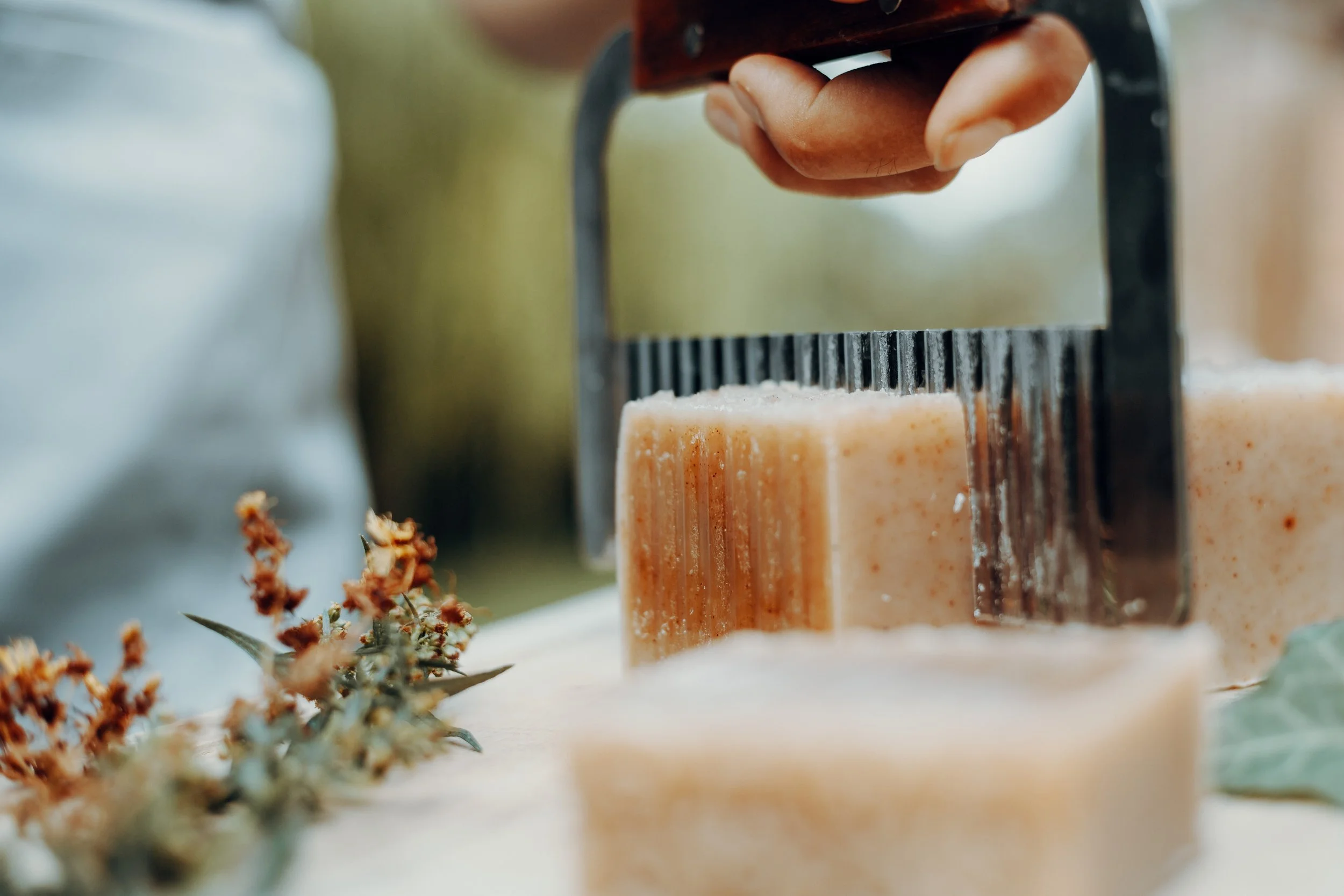 Hand cutting natural goat milk soap