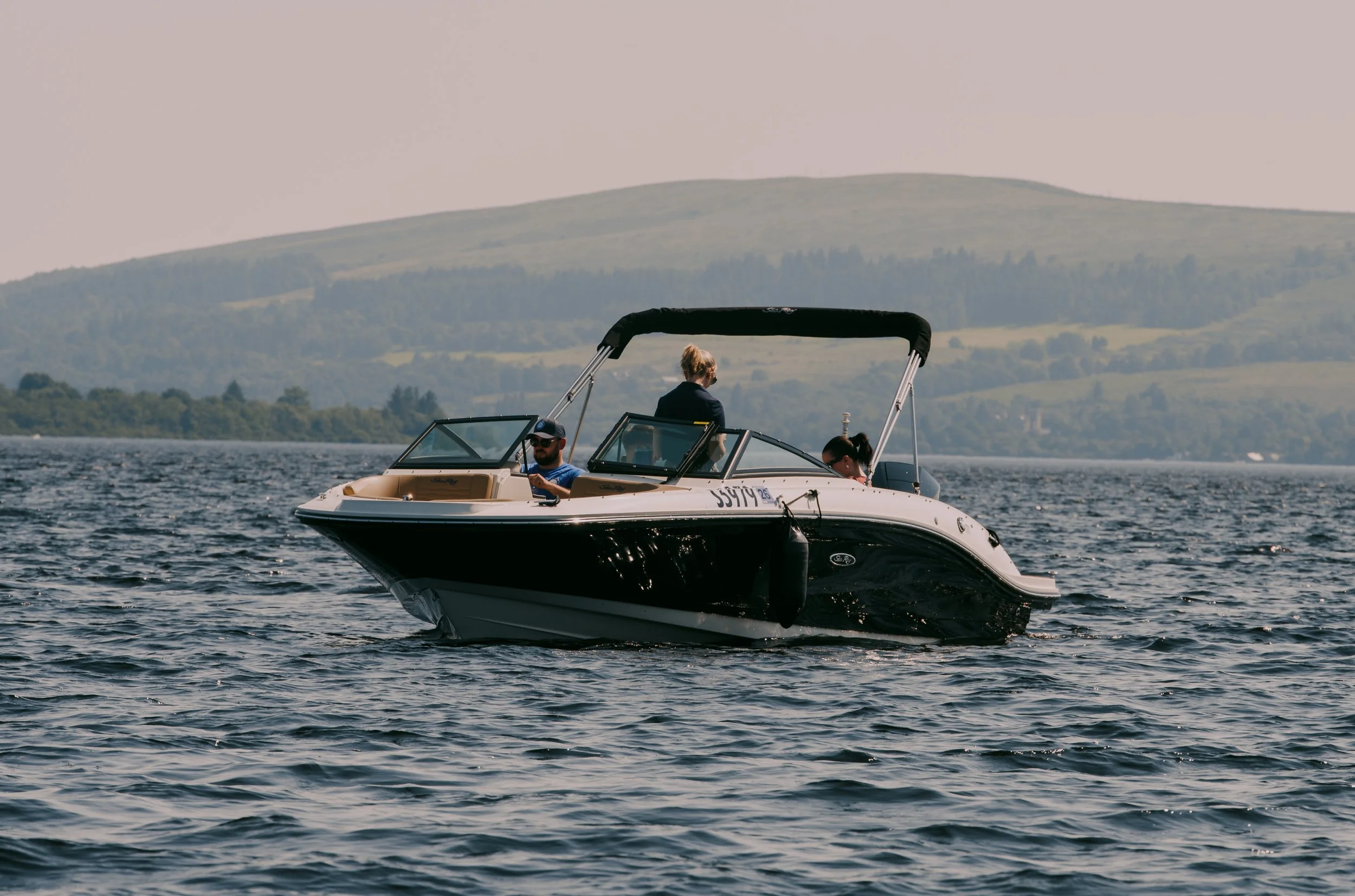 Speedboat trip on Loch Lomond near Luss, Scotland