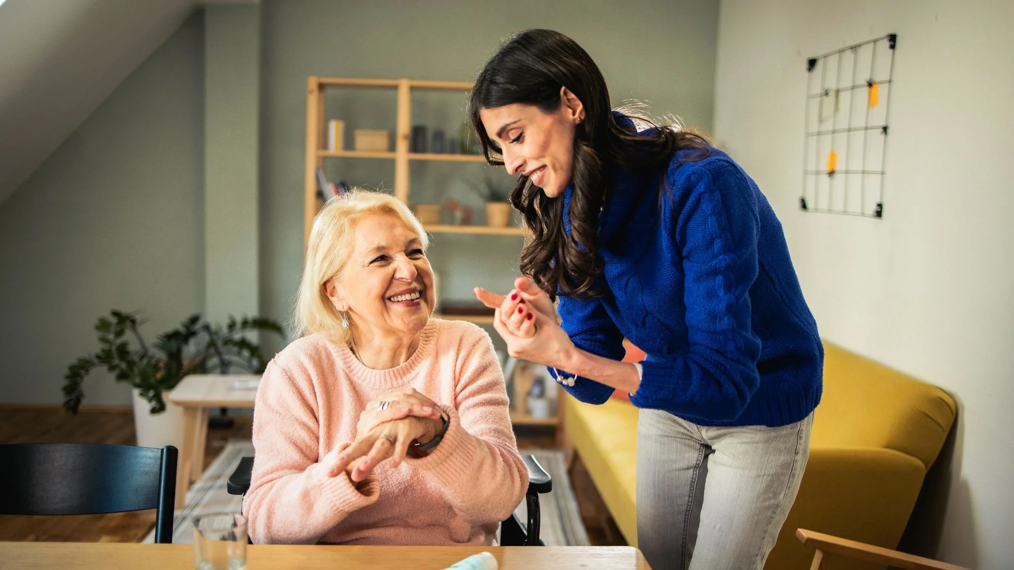 A supportive hand holding — compassionate elderly care