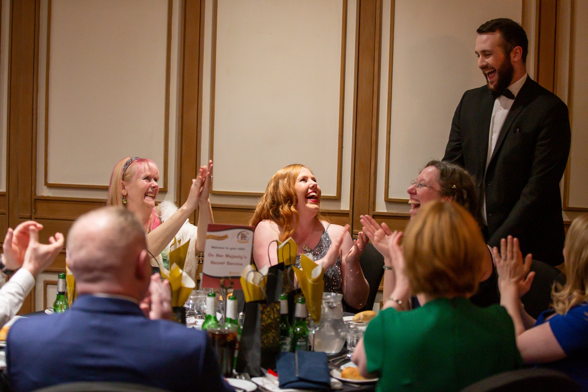 Magician for corporate events Magician is performing magic at a corporate event