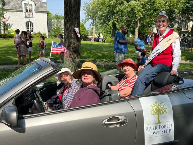 Older adults riding in the Memorial Day Parade