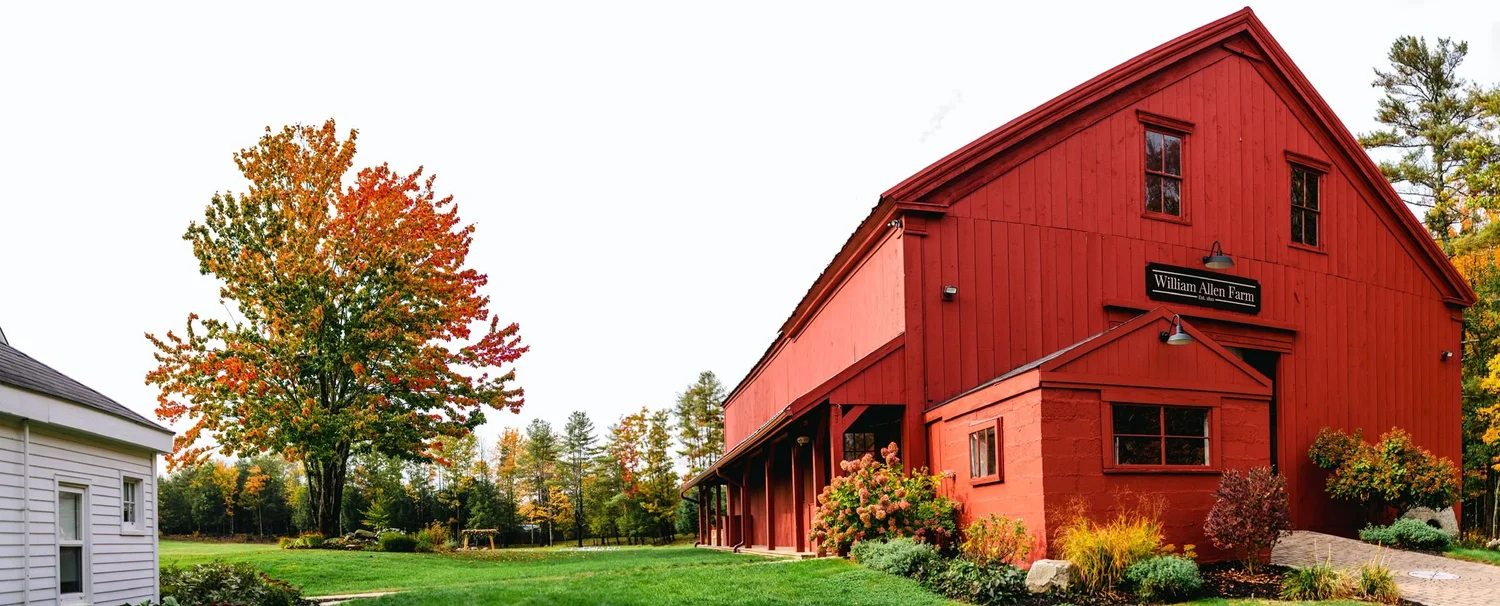 Panoramic view of the red barn and farmhouse at William Allen Farm in autumn