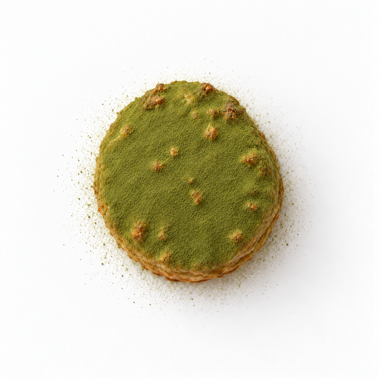 Puff pastry bite with cacio e pepe, dusted with green matcha.