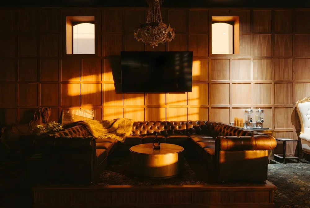 The paneled sitting room off the lobby