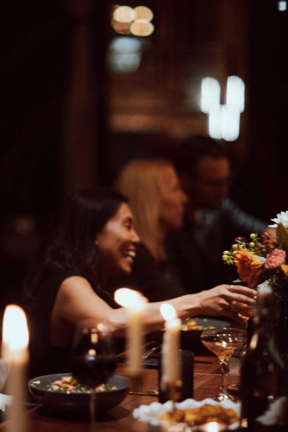 A guest at the candlelit table