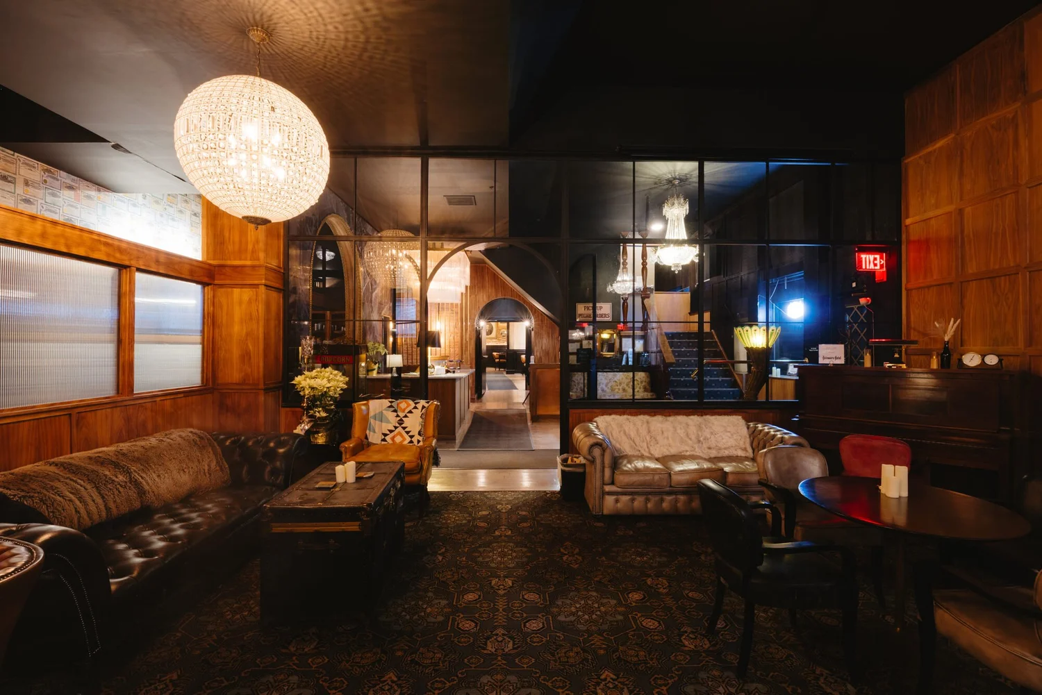 The lobby at the Delaware Hotel, with the bar and the grand staircase