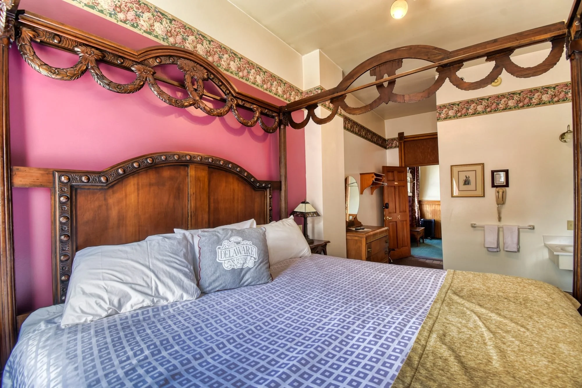 The four poster bed in Room 316 at the Delaware Hotel