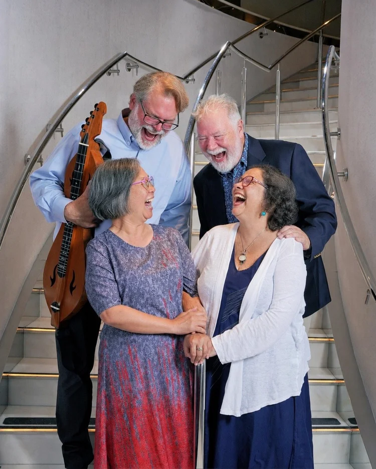 A laugh on the staircase · Alaska 2026
