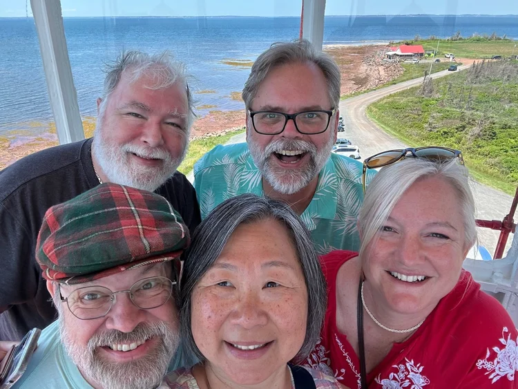 A lighthouse view with friends · Boston–Quebec City 2025
