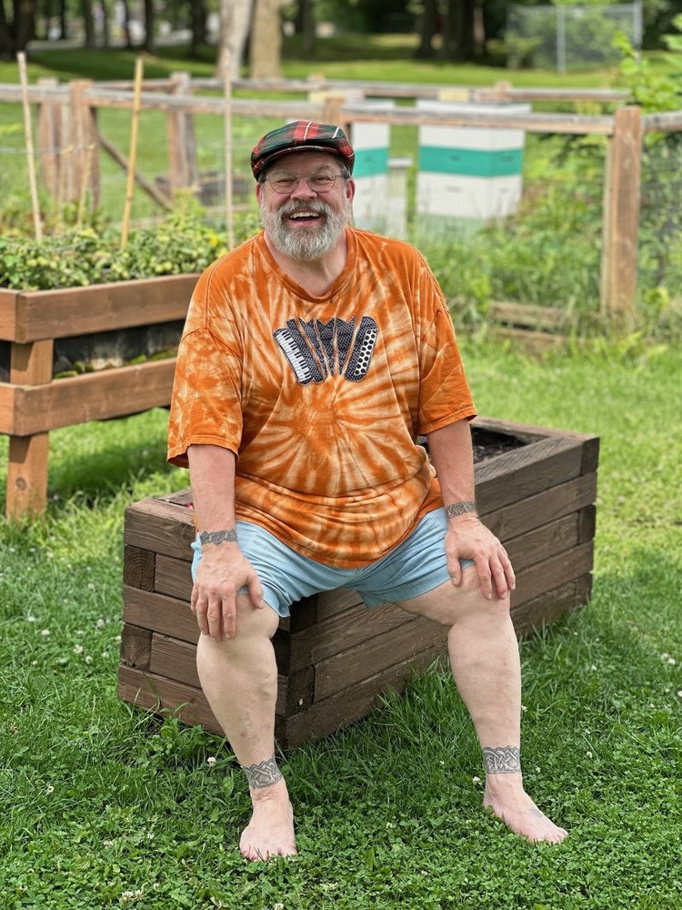 A laugh in the garden · Boston–Quebec City 2025