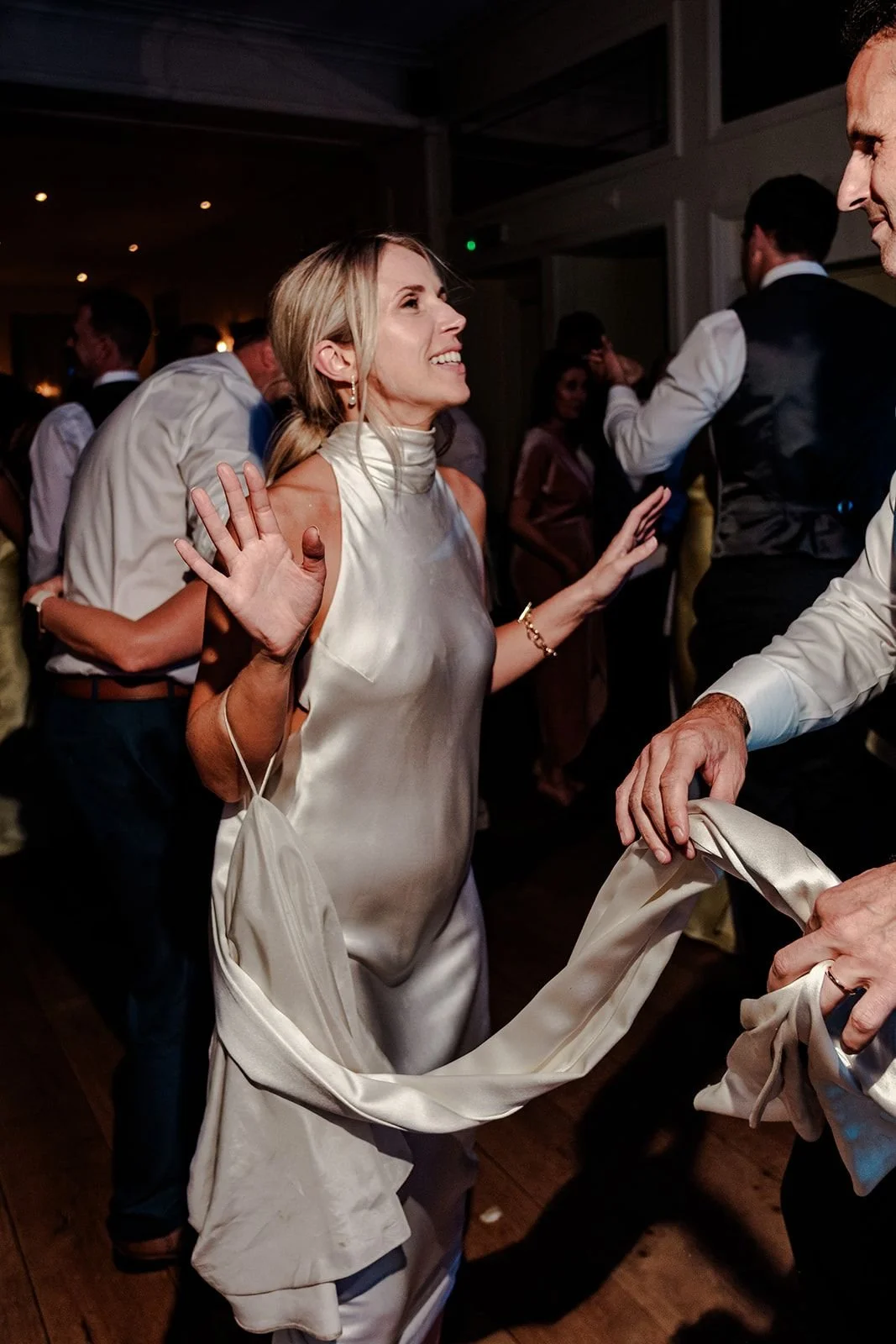 Friends laughing on the dance floor at Hotel du Vin Tunbridge Wells