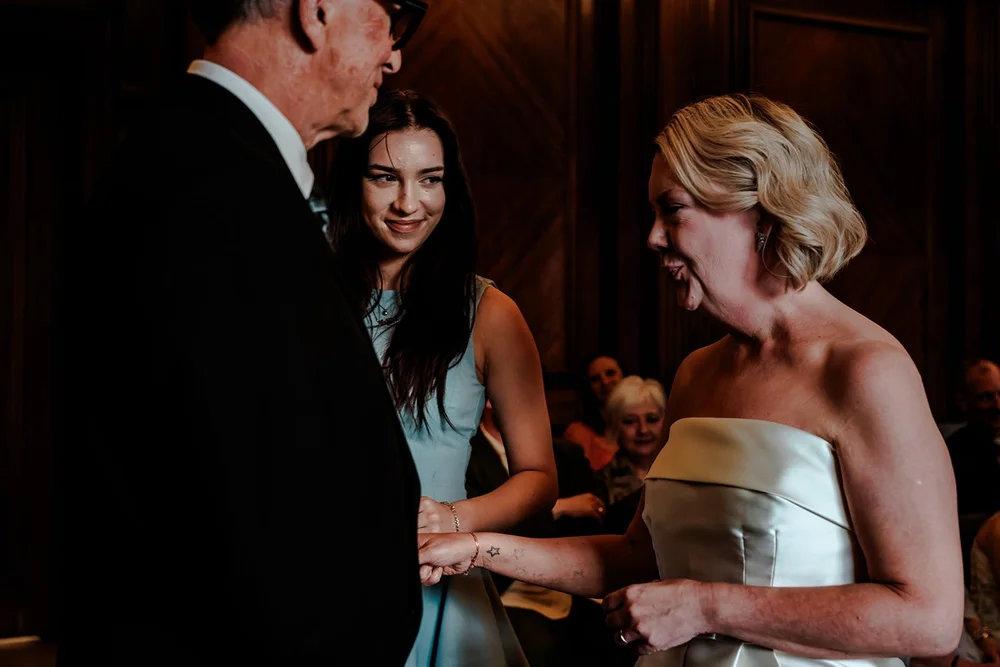 Wedding ceremony inside Old Marylebone Town Hall, documentary photography by Oliver Holder - 8
