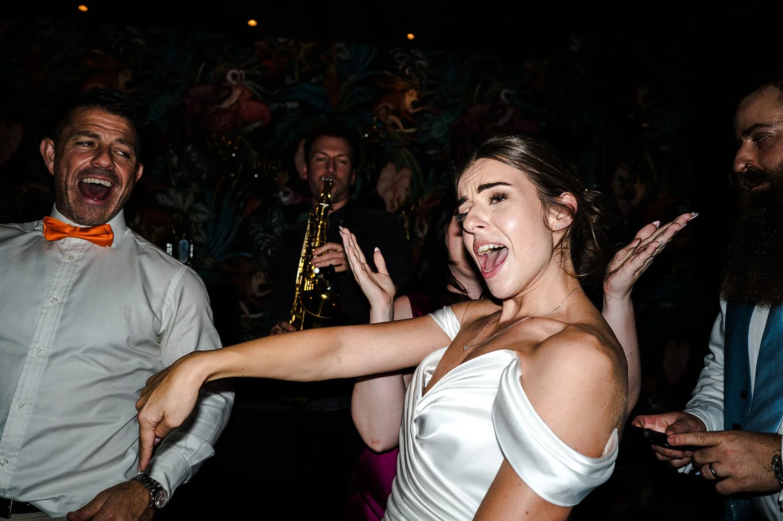 Nat dancing with the saxophone player, incredible energy