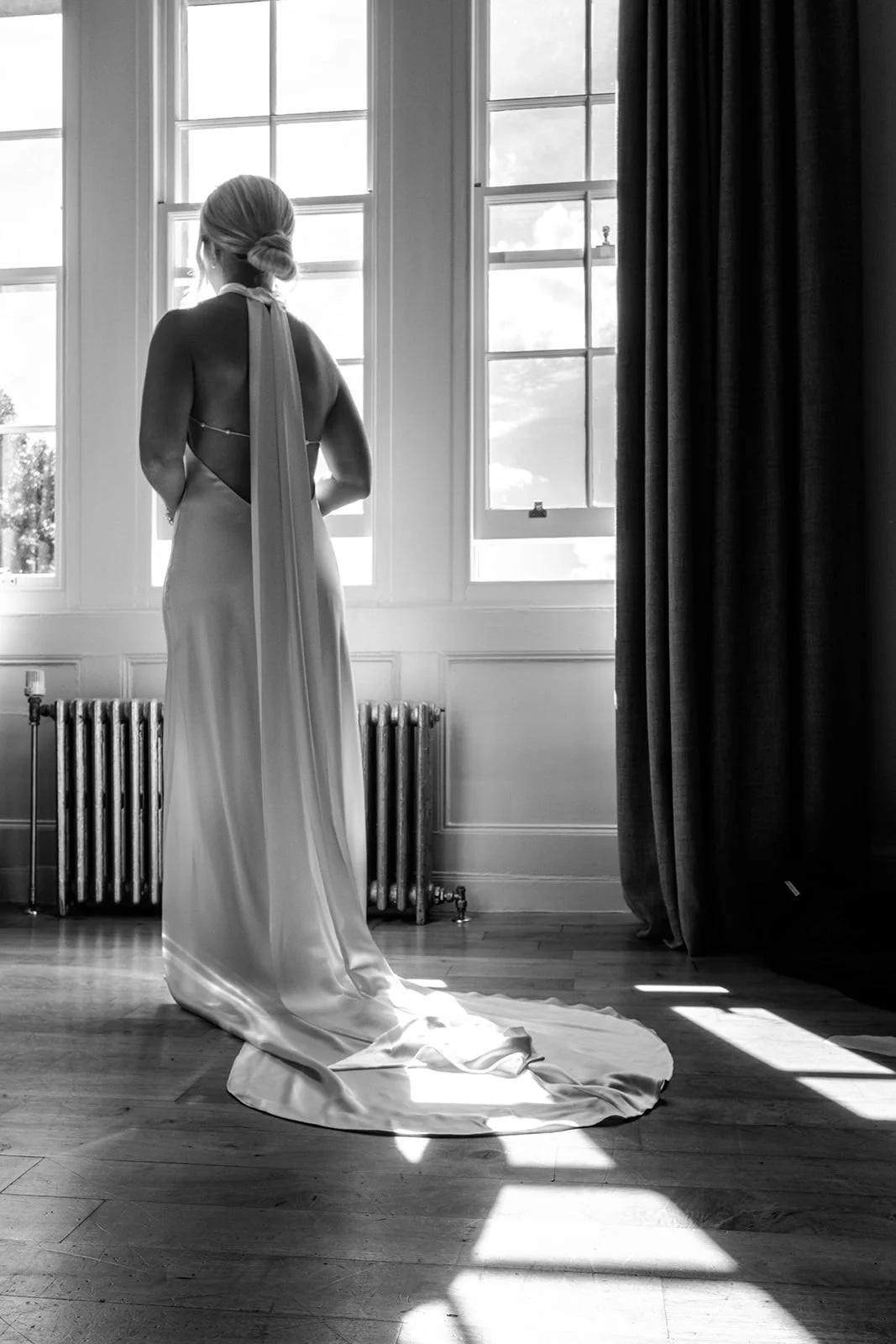 Full length portrait of the bride in her Own Studio gown at Hotel du Vin Tunbridge Wells