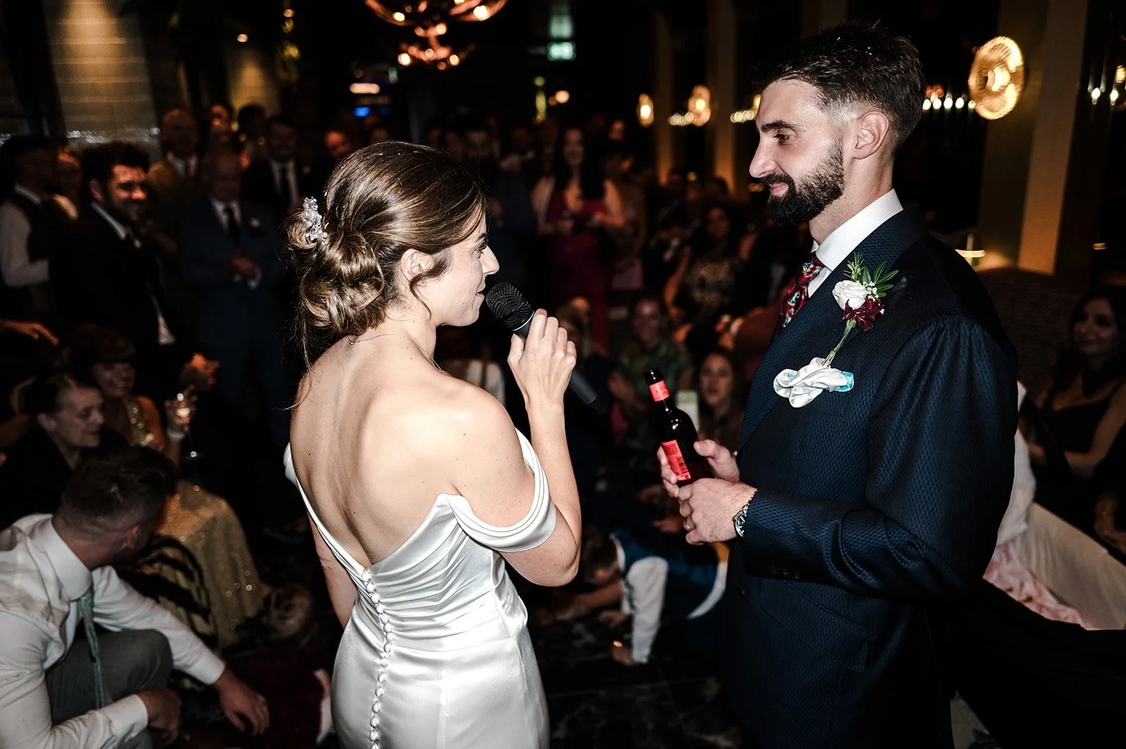 Nat and Josh chatting during the reception