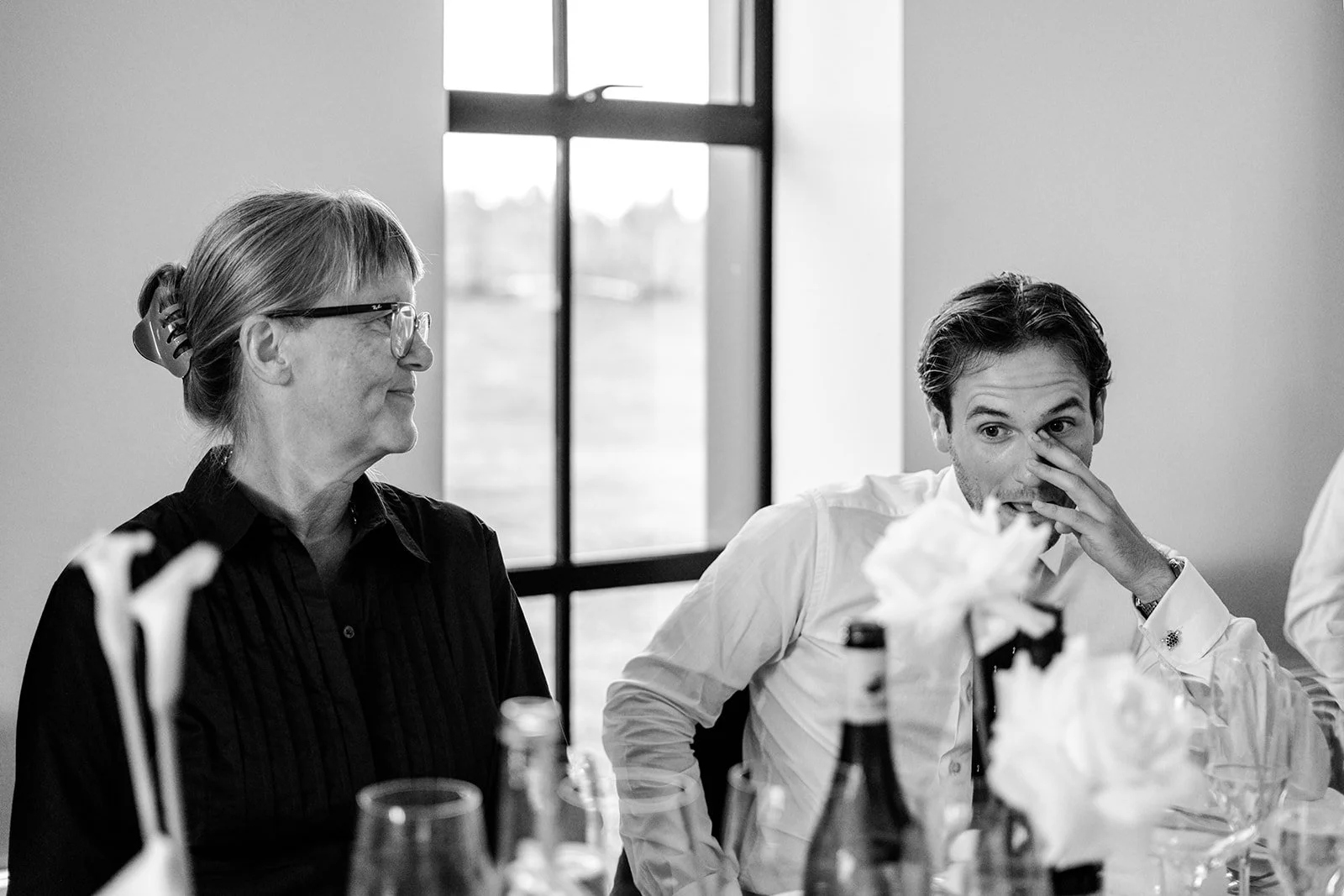 Candid guest reaction shot during the speeches at Limekiln — genuine, unposed emotion