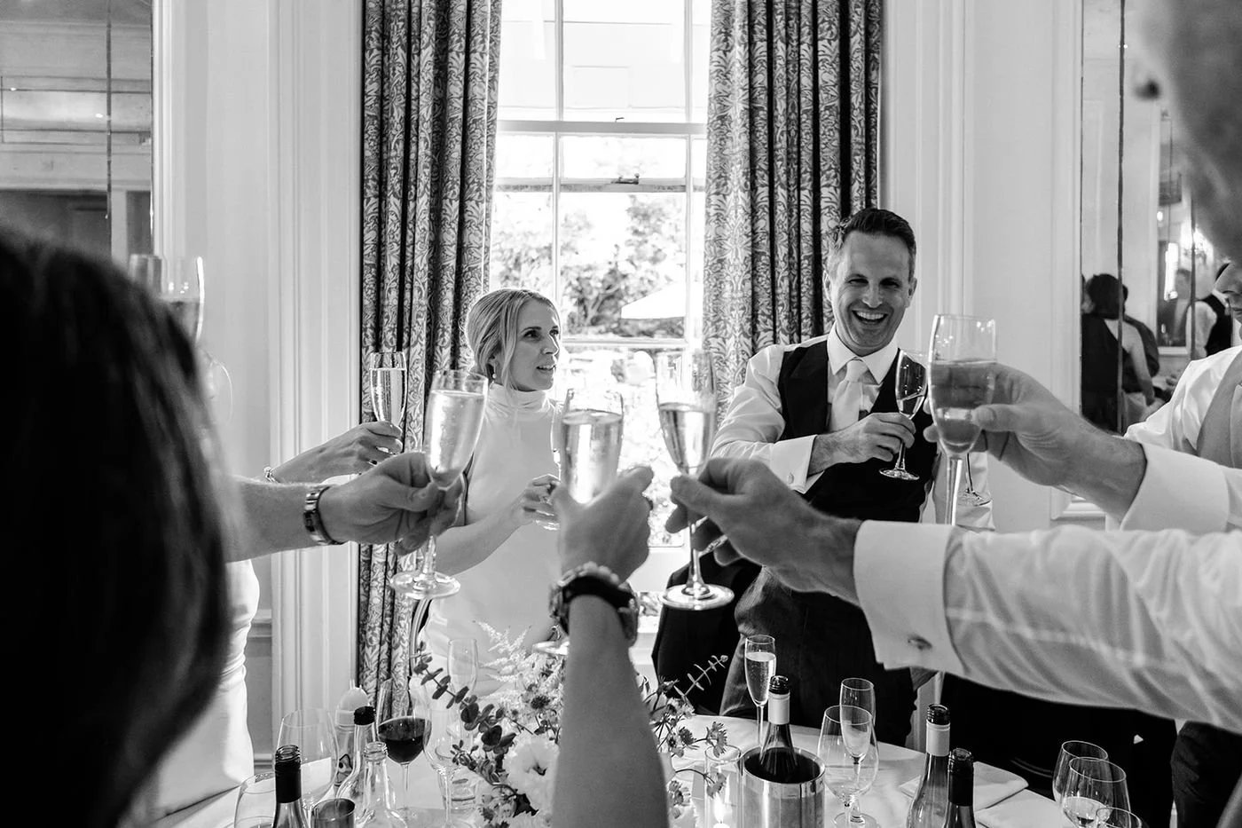 Wedding table detail with candles and flowers at Hotel du Vin Tunbridge Wells