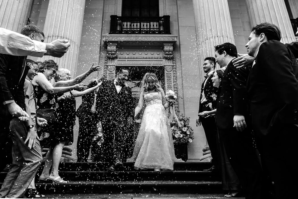 Confetti on the steps of Old Marylebone Town Hall, documentary wedding photography by Oliver Holder - 5