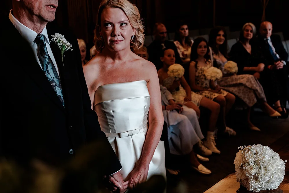 Wedding ceremony inside Old Marylebone Town Hall, documentary photography by Oliver Holder - 6
