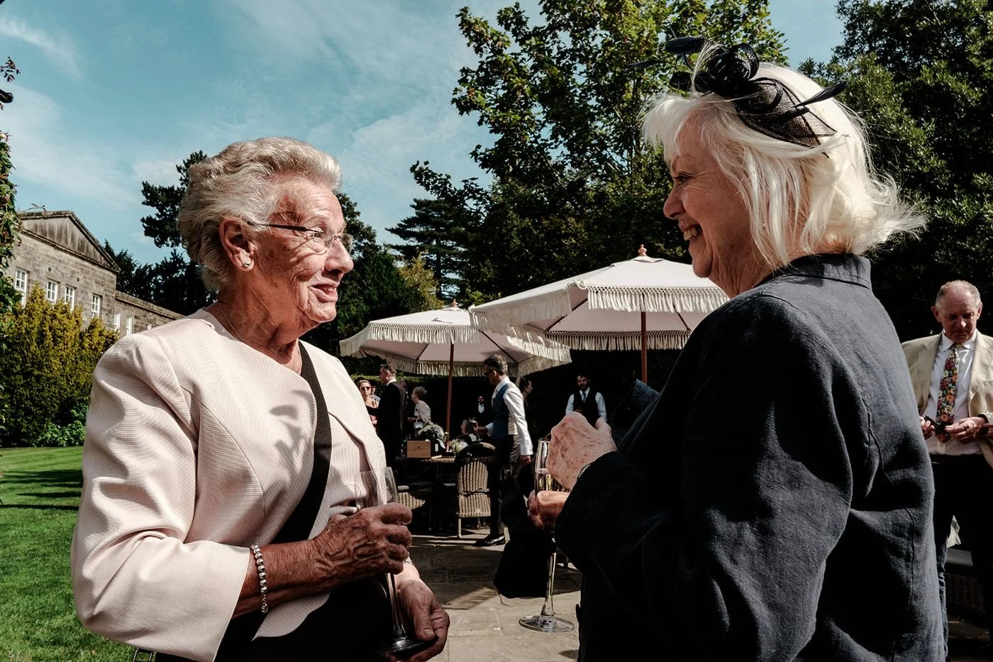 Wedding guests with canapes and drinks at Hotel du Vin Tunbridge Wells walled garden