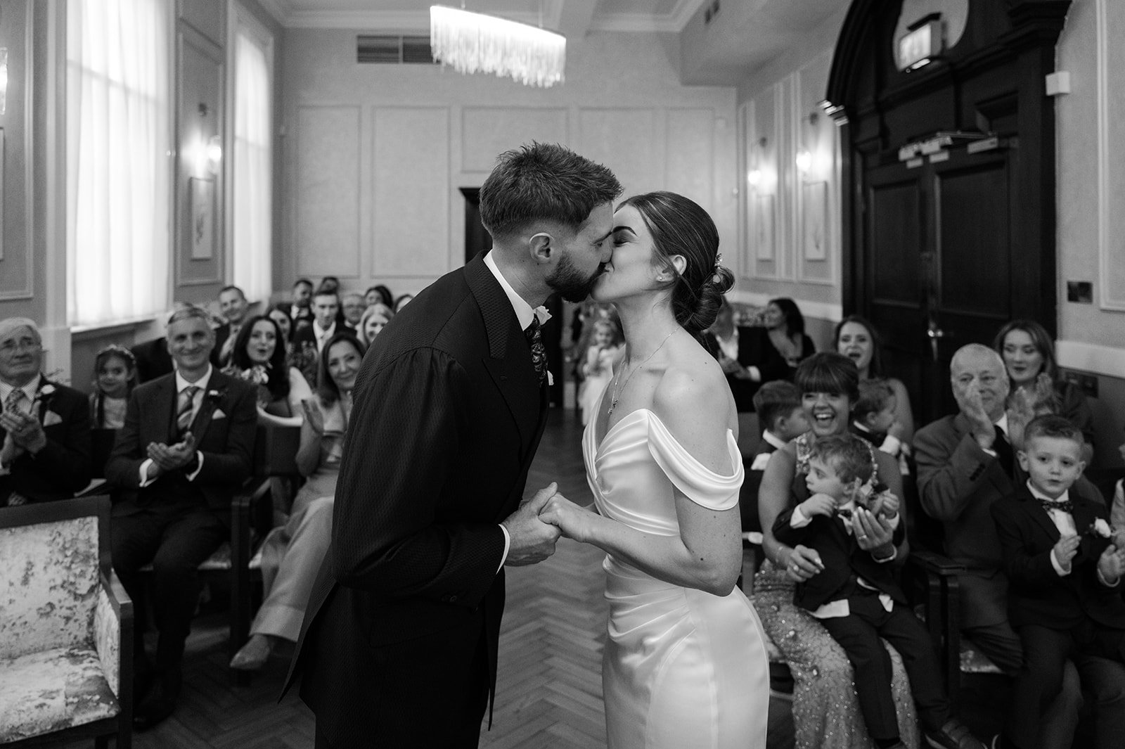 Nat and Josh first kiss as husband and wife at Chelsea Town Hall