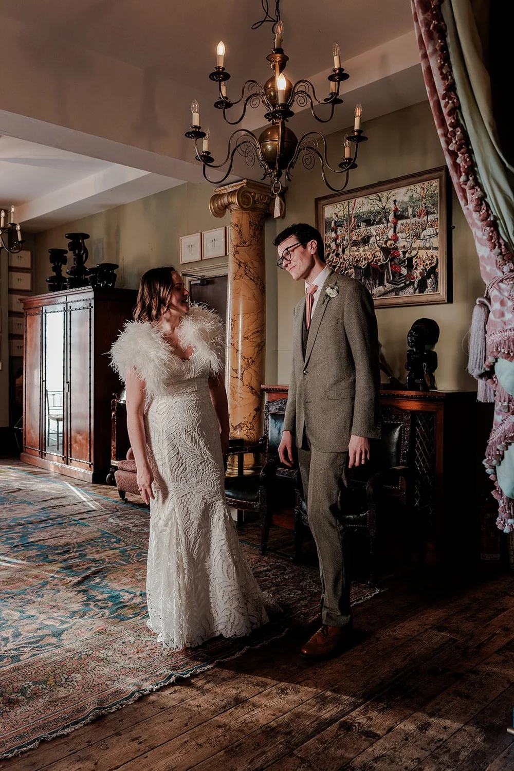 Guests at Brunswick House wedding, antique filled room with chandeliers, Oliver Holder Photography