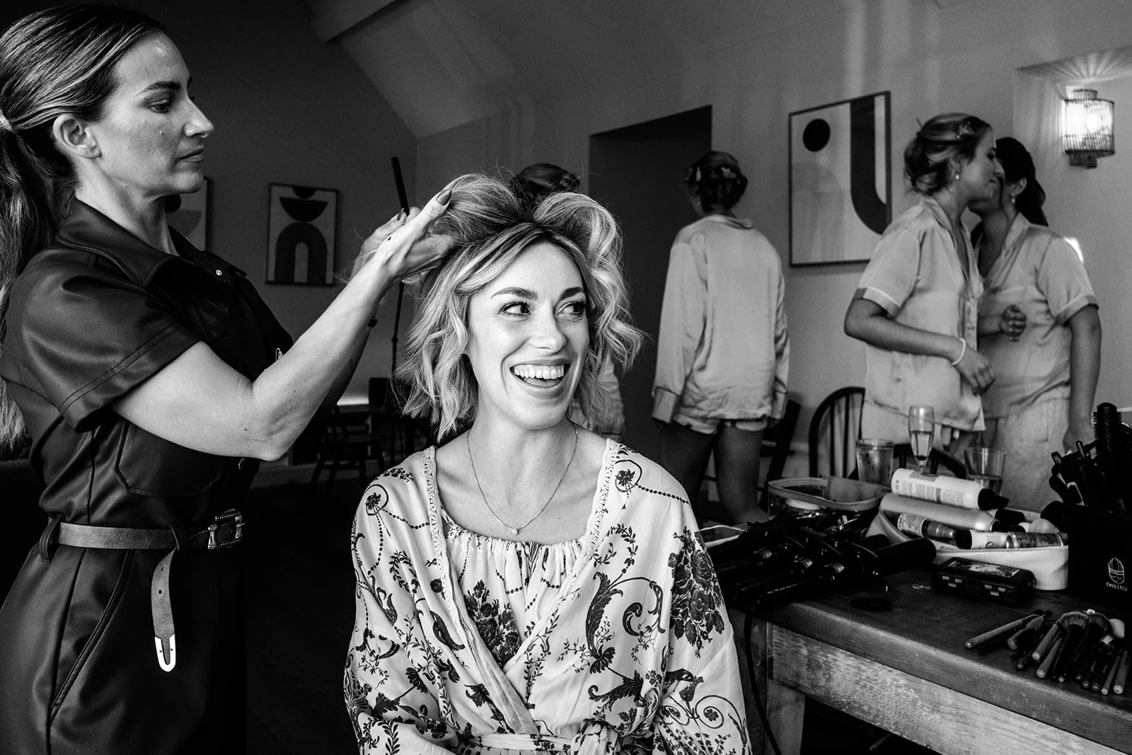 Abi and her bridesmaids sharing a moment together during the morning preparations at Limekiln East Sussex