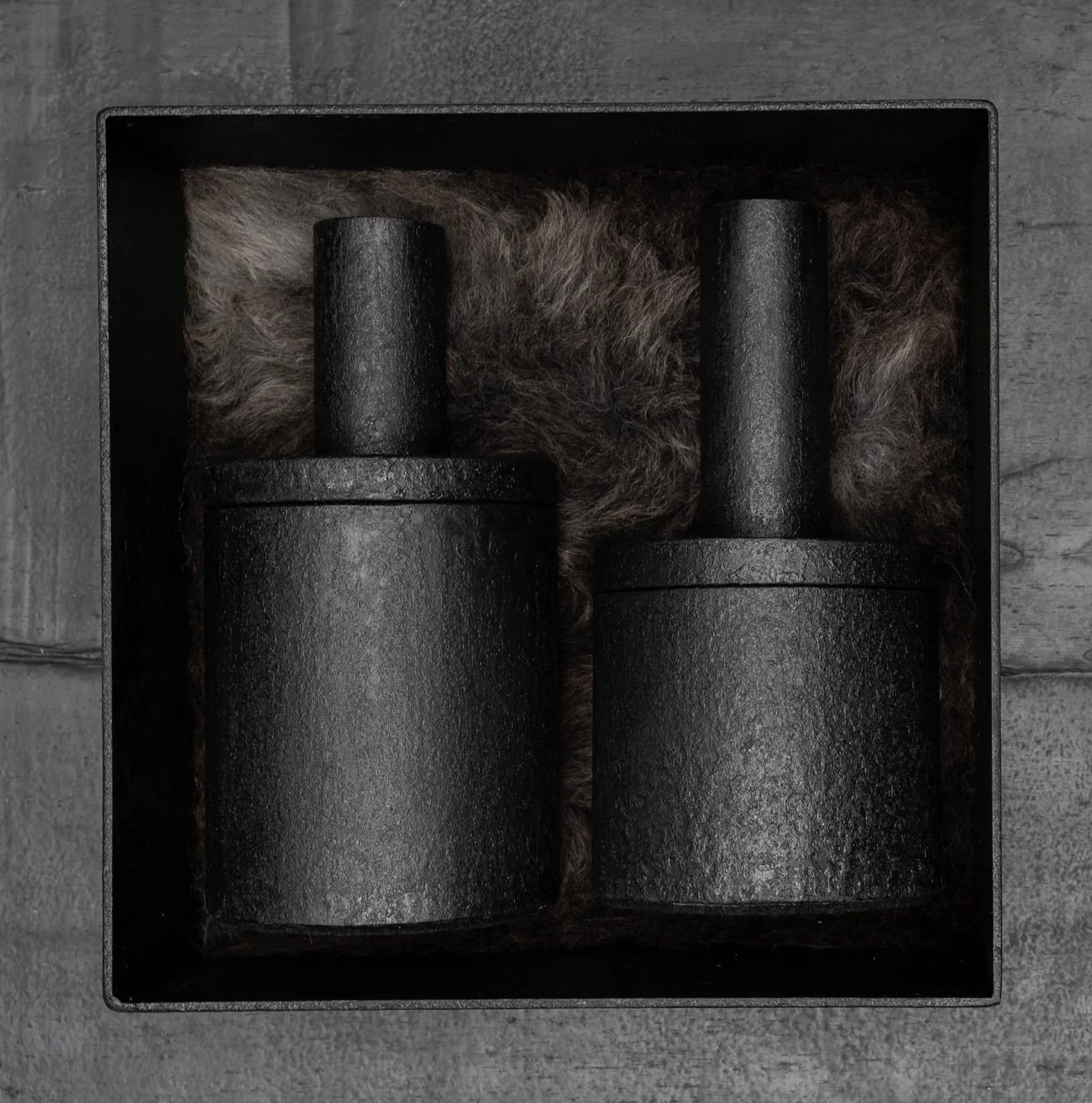 Oxidarium limited edition kit: two handmade metal containers in a wool-lined burned-metal box