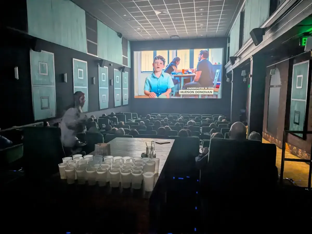 The audience watches 15 DAYS at the New Canaan Playhouse