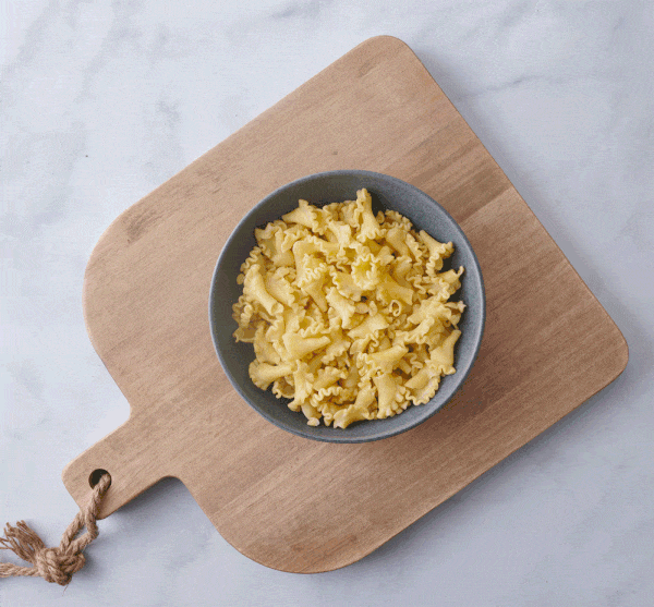 Graza olive oil and chili drizzled over pasta, CPG pantry stop motion GIF