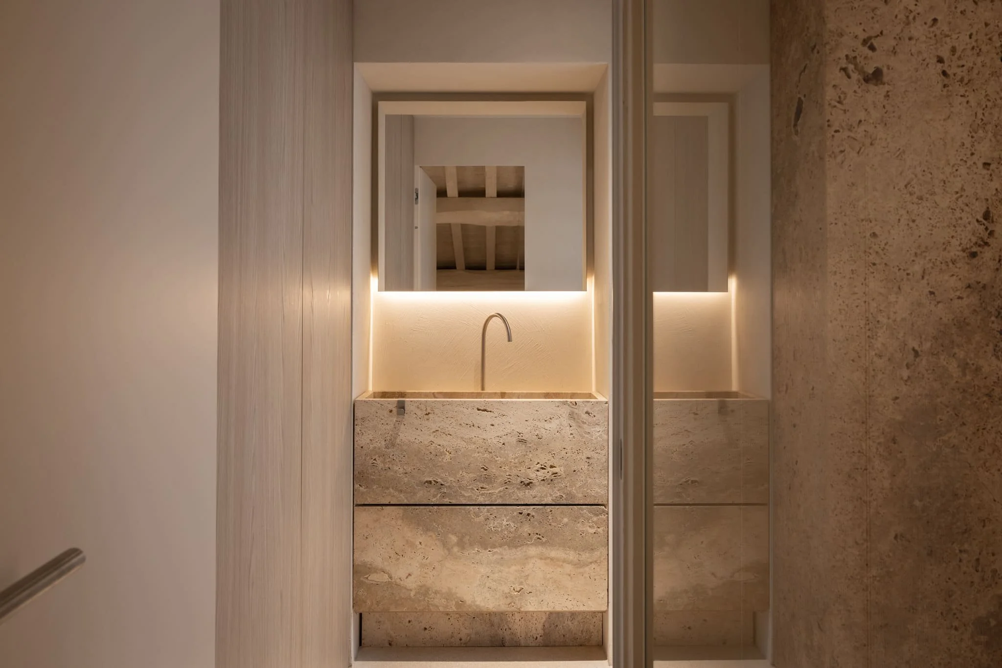 A travertine washbasin at Nomos Hotel