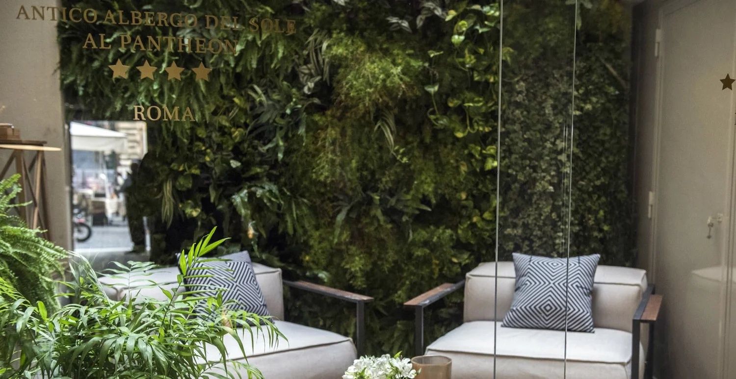 Lobby of the Sole al Pantheon with a living green wall