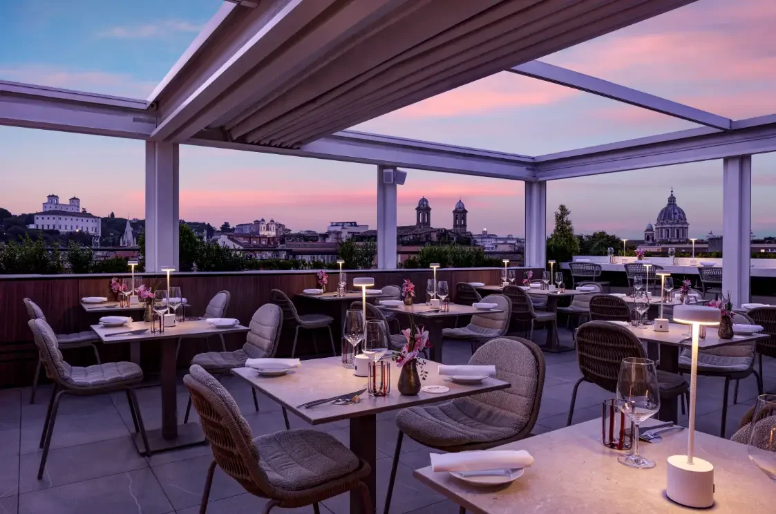 The First Arte rooftop terrace at dusk