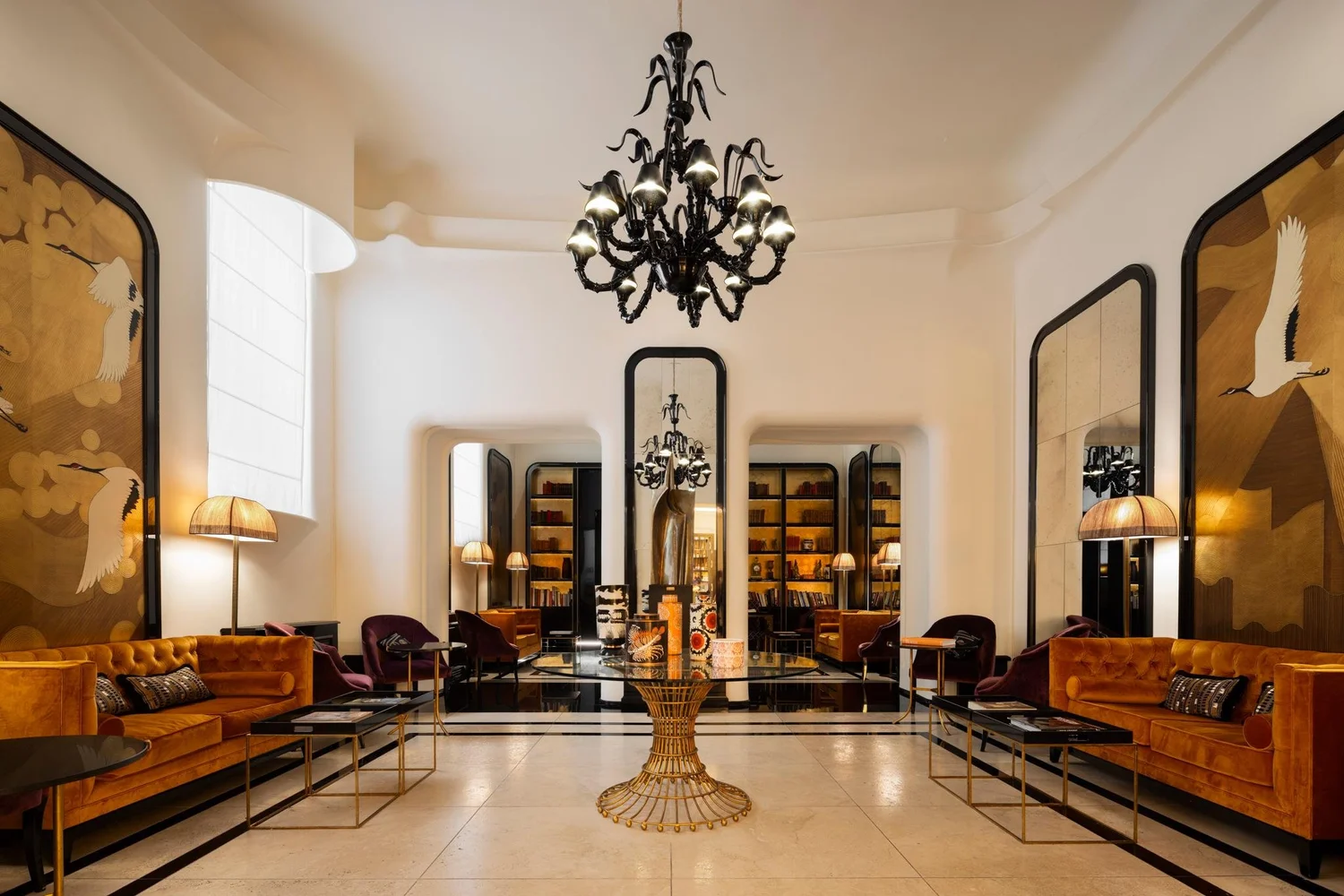 Foyer lounge at Palazzo Ripetta with orange sofas