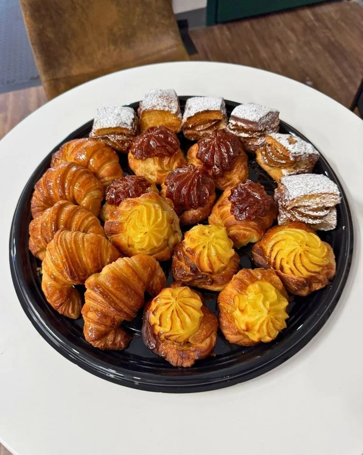 Platter of medialunas and facturas