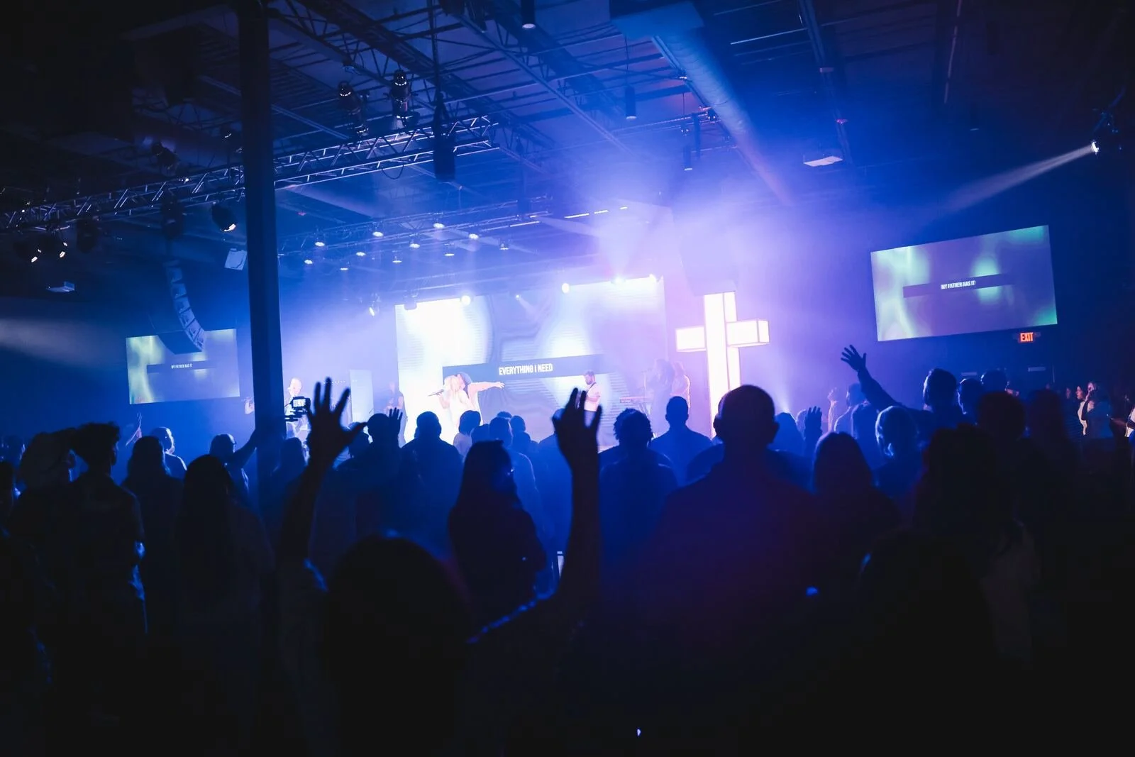 Worship night with hands raised at Kingdom City