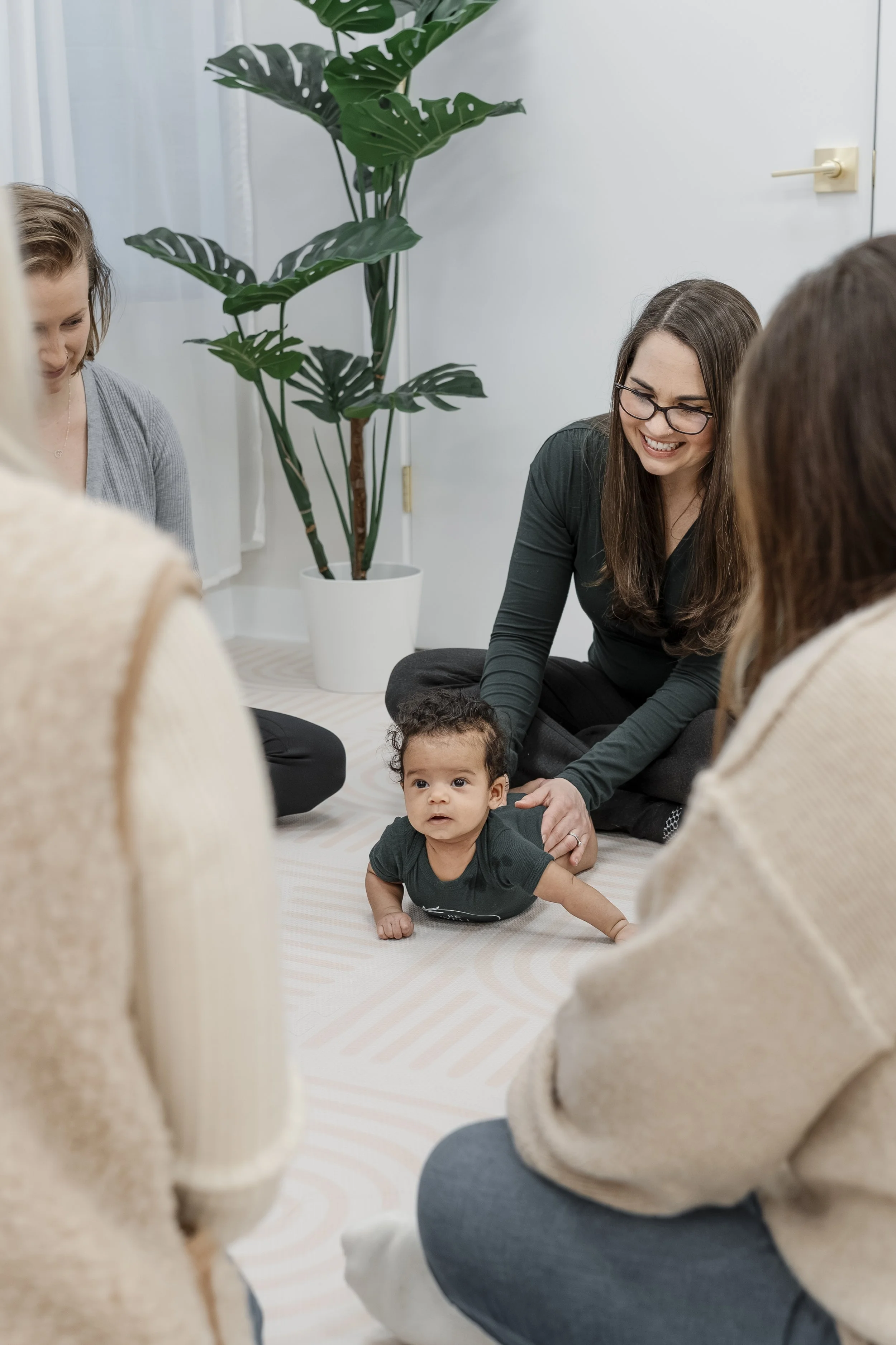 Dr. Emily Spaeth working with a baby