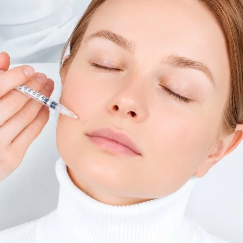 Woman receiving a cosmetic injectable treatment